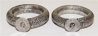 A Pair of Yemeni Silver Bangles Diameter of exterior 3 1/2 inches.