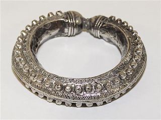 A Yemeni Silver Bangle Diameter of exterior 3 3/4 inches.