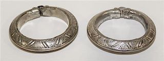 A Pair of Yemeni Silver Bangles Diameter of exterior 3 3/4 inches.