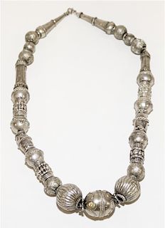 A Bedouin Silver and Mixed Metal Beaded Necklace Length of chain 25 inches.