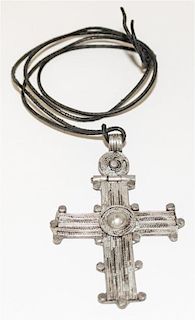 A Silver Cross Pendant Length 4 inches.
