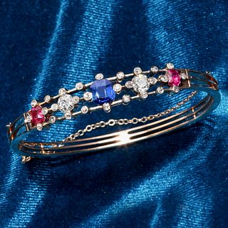 ANTIQUE DIAMOND, SAPPHIRE AND RUBY HINGED BANGLE,