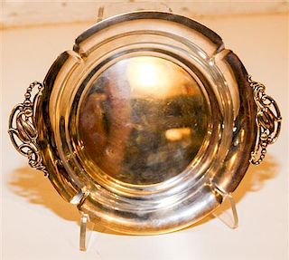 * An American Silver Dish, Shreve & Co., San Francisco, CA, of lobed circular form, having stylized floral bud handles.