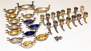 * A Set of Silver Salts and Castors Height of tallest 2 1/2 inches.