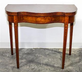 * A Marquetry Decorated Mahogany Game Table Height 28 3/4 x width 35 1/2 x depth 17 1/4 inches.