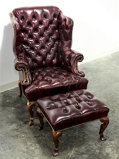 A Leathercraft Wingback Chair and Ottoman Height of chair 45 inches.