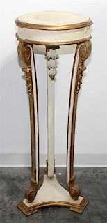 * A Neoclassical Painted and Parcel Gilt Pedestal. Height 43 inches.