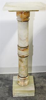 * A Continental Onyx Pedestal. Height 38 inches.