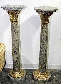 * A Pair of Continental Gilt Metal Mounted Marble Pedestals. Height 44 3/4 inches.