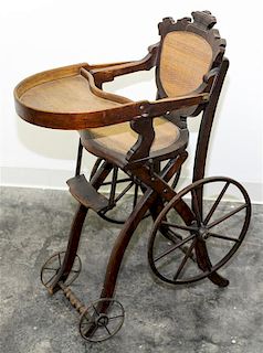 * A Victorian Metamorphic High Chair/Stroller Height 36 inches.