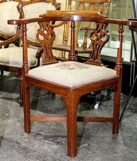 A George III Style Mahogany Corner Chair Height 31 inches.