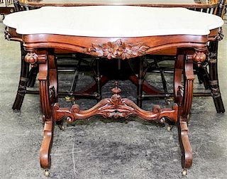 A Victorian Walnut Occasional Table Height 29 inches.