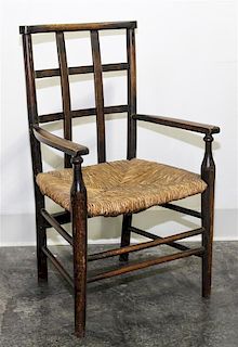 * An American Walnut Child's Chair Height 25 3/4 inches.