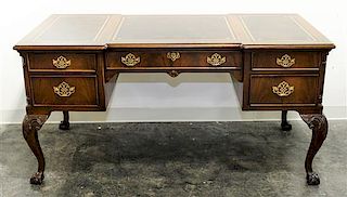 A Georgian Style Mahogany Desk, Sligh Height 29 1/2 x width 30 x length 59 inches.
