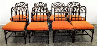A Set of Eight Rattan Dining Chairs Height 36 1/2 x width 18 x depth 24 inches.