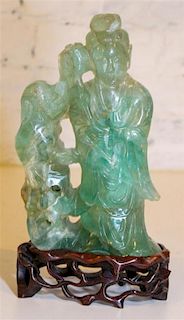 A Green Quartz Figural Group Height 8 1/2 inches.