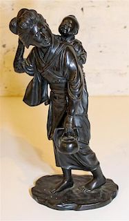 * A Japanese Bronze Figural Group. Height 15 1/4 inches.