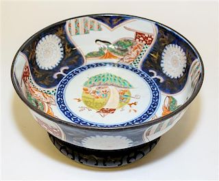 An Imari Palette Porcelain Center Bowl Height of bowl 3 5/8 x diameter 9 1/2 inches.