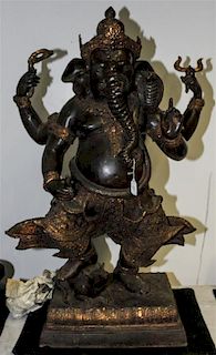 * An Indian Bronze Ganesha Stepping on a Rat. Height 38 1/2 inches.