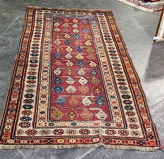 * A Northwest Persian Wool Rug 7 feet 7 inches x 3 feet 6 inches.