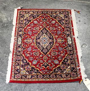 A Persian Wool Mat. 3 feet 2 inches x 2 feet 2 inches.