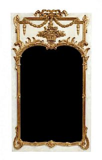 A French Painted and Parcel Gilt Trumeau Mirror, Height 63 1/4 x width 36 3/4 inches.