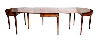An English Gate-Leg Dining Table, Height 28 1/2 x width 74 3/8 inches (open).