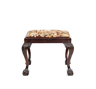 A George III Style Tapestry Upholstered Foot Stool, Height 18 x width 21 x depth 17 inches.
