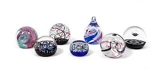 A Collection of Scottish Glass Paperweights, Height of largest 3 inches.