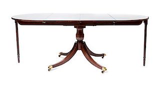 A Regency Style Mahogany Pedestal Table, Height 28 3/4 x width 78 x depth 42 inches.