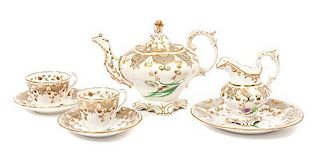 An English Porcelain Partial Tea Service, Height of first 7 inches.