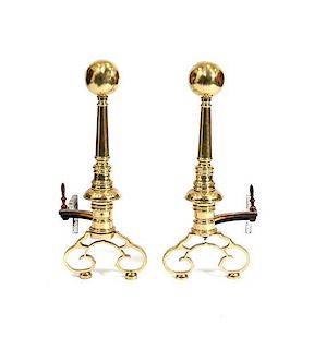 A Pair of Brass Andirons, Height 25 1/2 x width 10 1/2 x depth 21 inches.