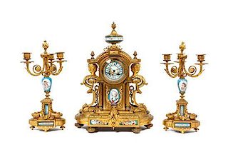 A Louis XVI Sevres Porcelain Mounted Gilt Metal Clock Garniture, Height of clock 19 inches.