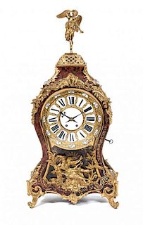 * A French Gilt Bronze Mounted Boulle Bracket Clock, Height 36 inches.