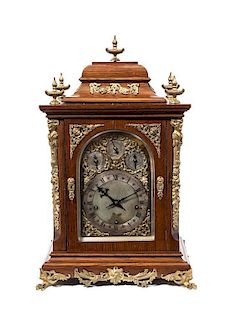 * A German Gilt Metal Mounted Mahogany Mantel Clock, Winterhalder & Hofmeier, Height 25 1/4 inches.