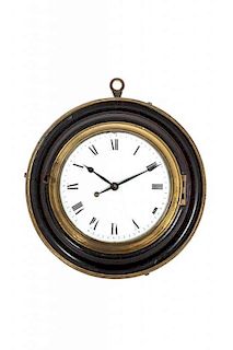 An Ebonized and Parcel Gilt Wall Clock, Diameter 6 1/4 inches.