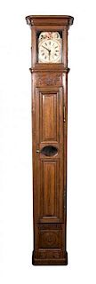 A French Provincial Oak Tall Case Clock, Height 98 x width 14 x depth 18 inches.