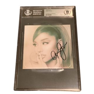 Ariana Grande Signed CD Booklet (Beckett)