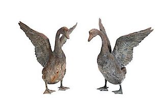 A Pair of Bronze Geese, Height 28 x width 28 x depth 23 inches.