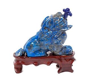 * A Carved Lapis Figural Snuff Bottle, Height 2 3/8 inches.