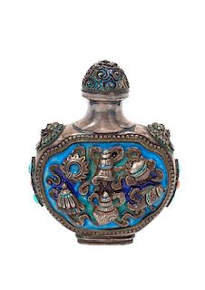 * A Tibetan Enameled and Silver Snuff Bottle, Height 3 1/4 inches.