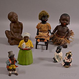 Seven Black Figures and Dolls