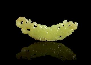 A Pierce Carved Yellow Jade Toggle, Width 2 5/8 inches.
