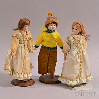 Three Small Bisque Lady Dolls