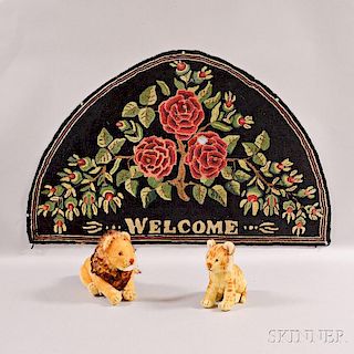 Two Vintage Steiff Lions and a Hooked "Welcome" Rug.