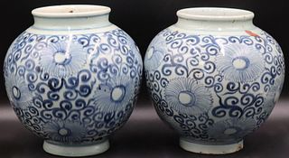 Pair of Chinese Blue and White Floral Jars.