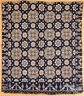 Blue and white Jacquard coverlet