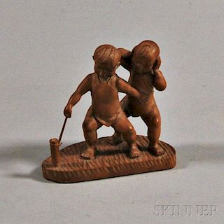 Wood Carving of Two Boys