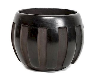 Sandy Harayo (20th Century), Santa Clara Blackware Jar Height 6 x diameter 6 3/4 inches.