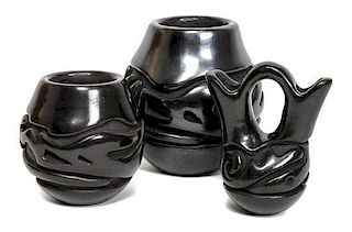 Three Teresita Naranjo (1919-1999), Santa Clara Carved Blackware Vessels Height of largest 2 1/2 x diameter 2 1/2 inches.
